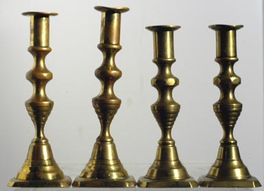 Pair of Diamond and Beehive Brass Candlesticks